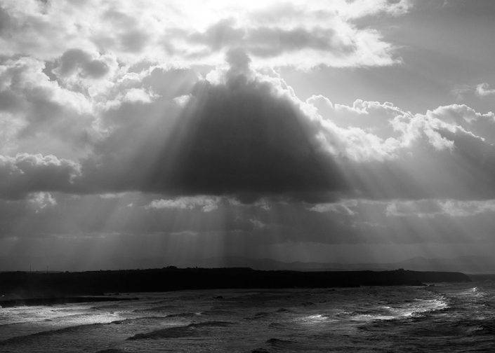 sol nubes y mar asturias